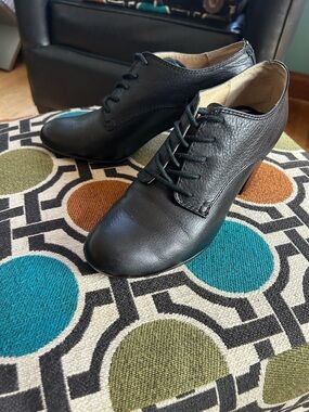 Frye high heeled black leather oxfords